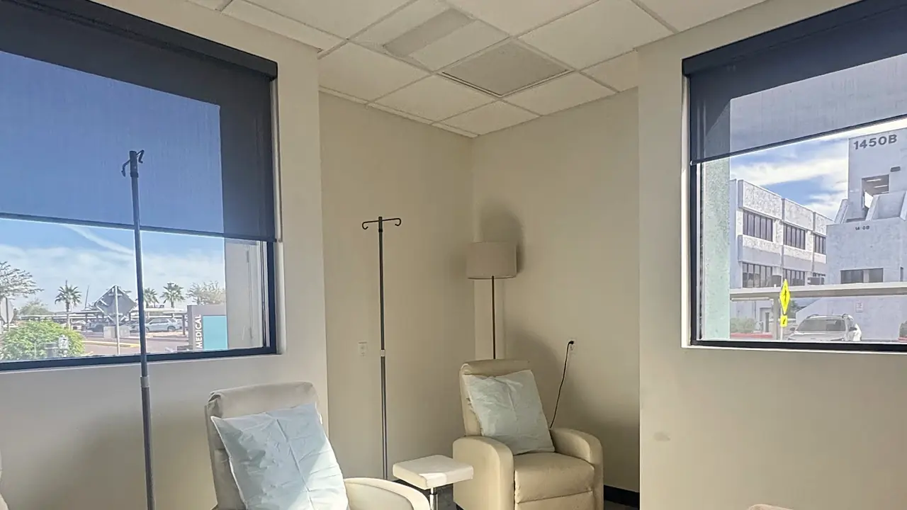 PISO Medical’s IV lounge: cream recliners beside a tall window overlooking the Banner Desert campus